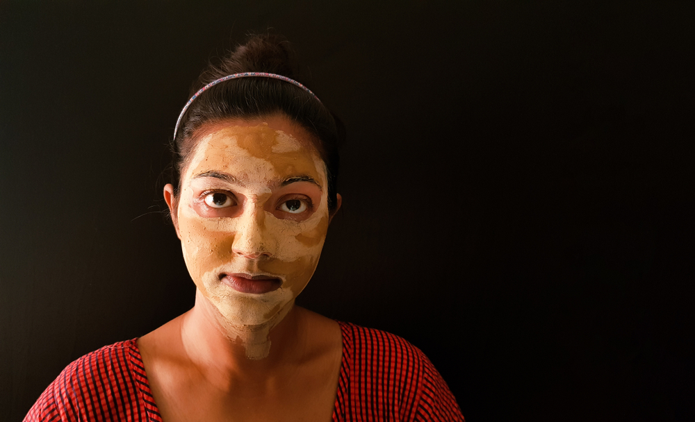 a lady with multani mitti face mask