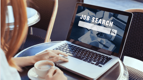 Woman using laptop searching for job