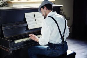 Person playing piano volo academy of music