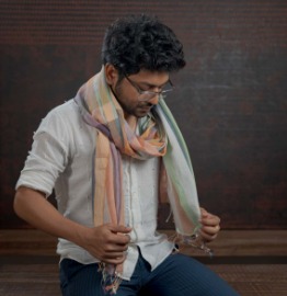 A man weared handwoven stoles