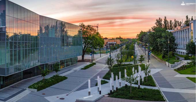 A wide view of Bennett University’s modern campus, showing its green lawns and stylish buildings.