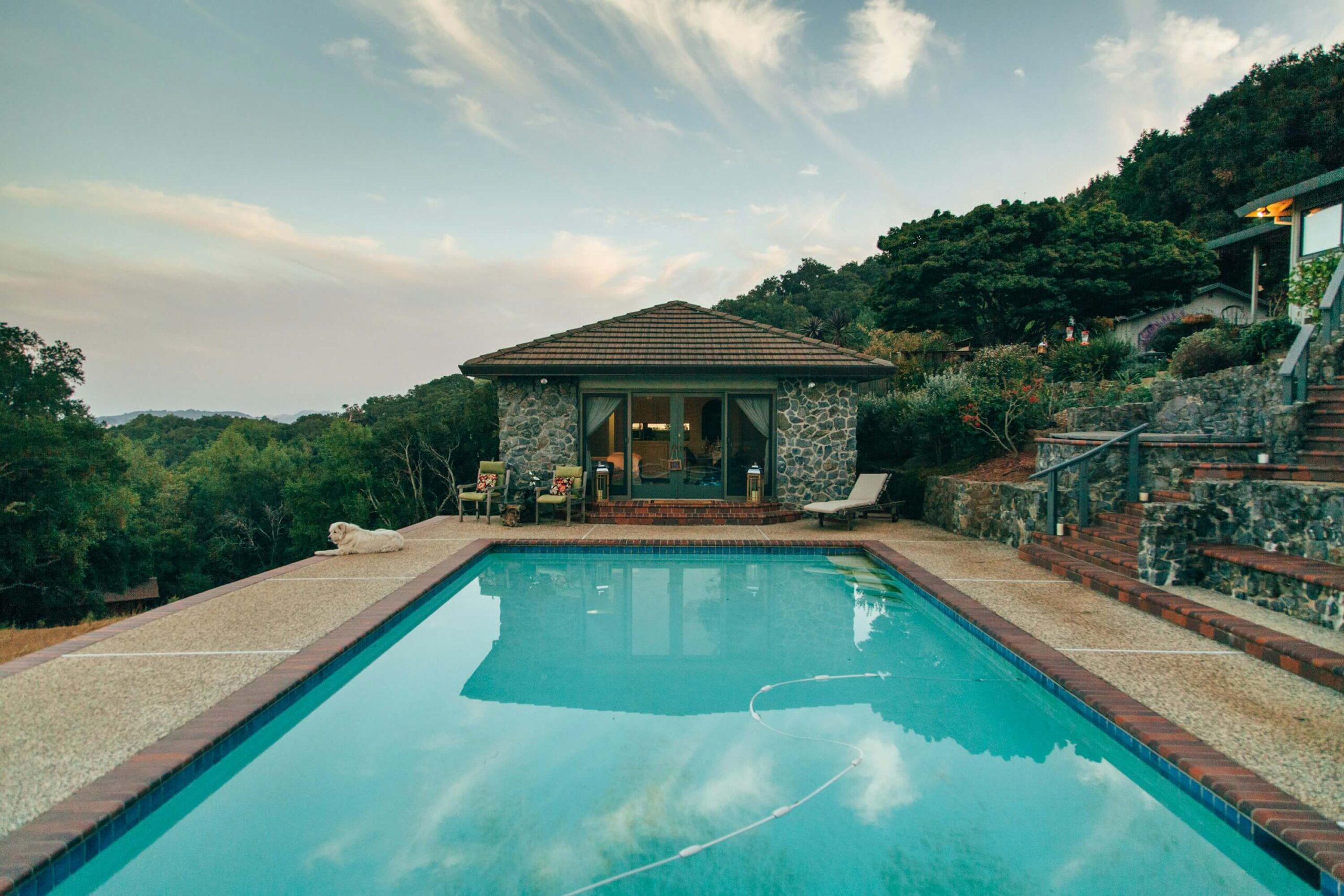 Luxurious Poolside Retreat with Stone Cottage and Scenic Views
