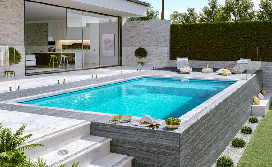 Modern above-ground pool with stone-finish walls, white tile surroundings, lounge chairs, and lush greenery in a backyard setting.