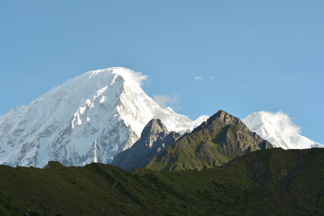 The breathtaking Majestic Mansaulu Ranges, standing tall against the clear blue sky, a true wonder of nature.