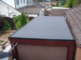 How Does Professional Flat Roofing Contribute to the Overall Aesthetics of a Building?
