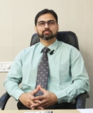 Dr. Anuj Bhide – Expert Spine Surgeon in Mumbai | Synapse Spine Clinic