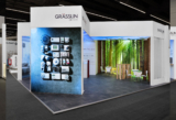 What are the benefits of investing in a custom exhibition stand in Munich?